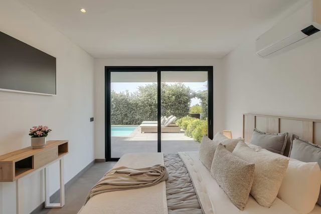 Bedroom with pool view